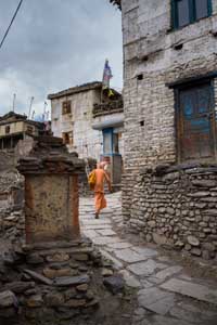 Hindu Baba Scurrying to the Buddhist Monastery